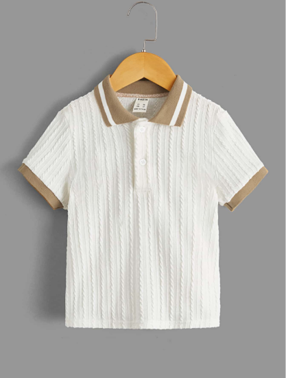 White textured polo shirt with brown trim on a hanger against a gray background